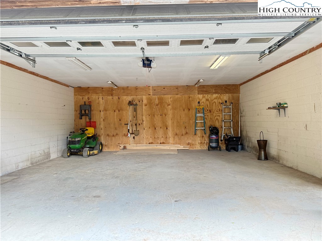 304 The Mulberry Cove Road Boone, NC 28607 - Photo 35 of 45 a view of a livingroom with gym equipment