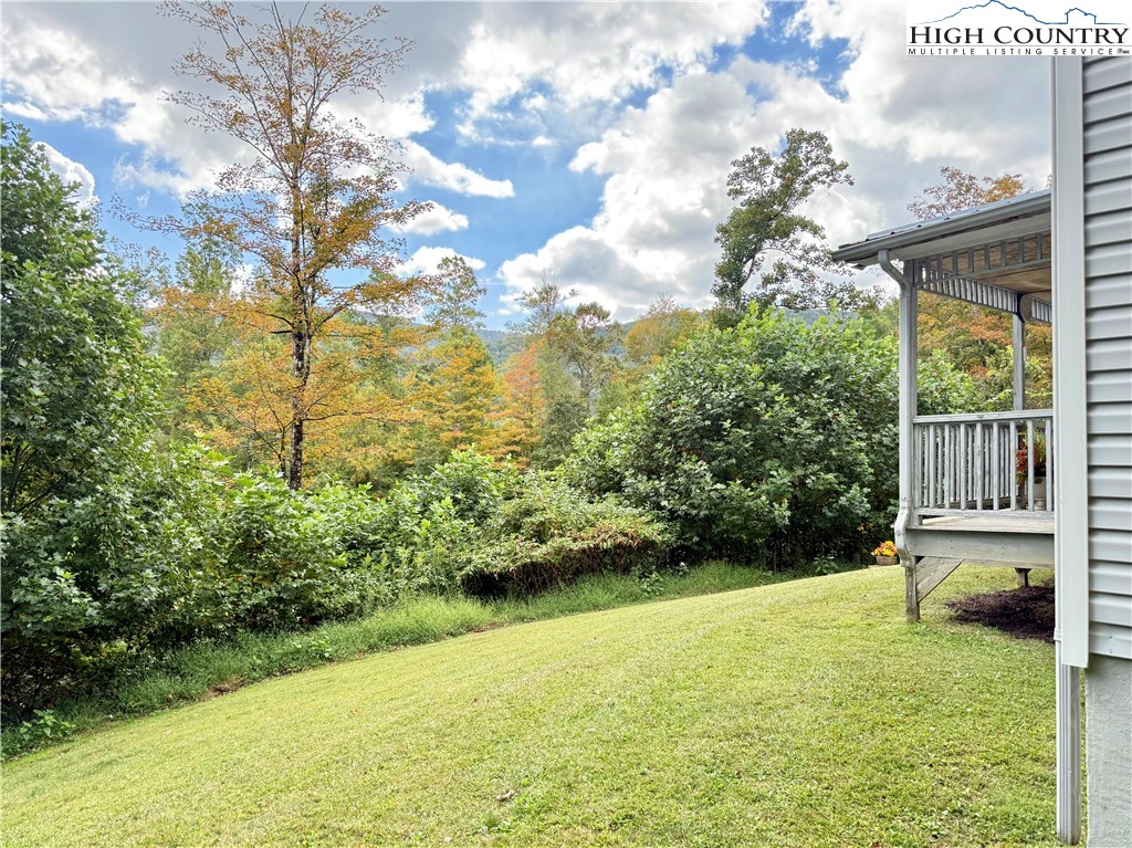 304 The Mulberry Cove Road Boone, NC 28607 - Photo 4 of 45 a view of a yard with an outdoor space