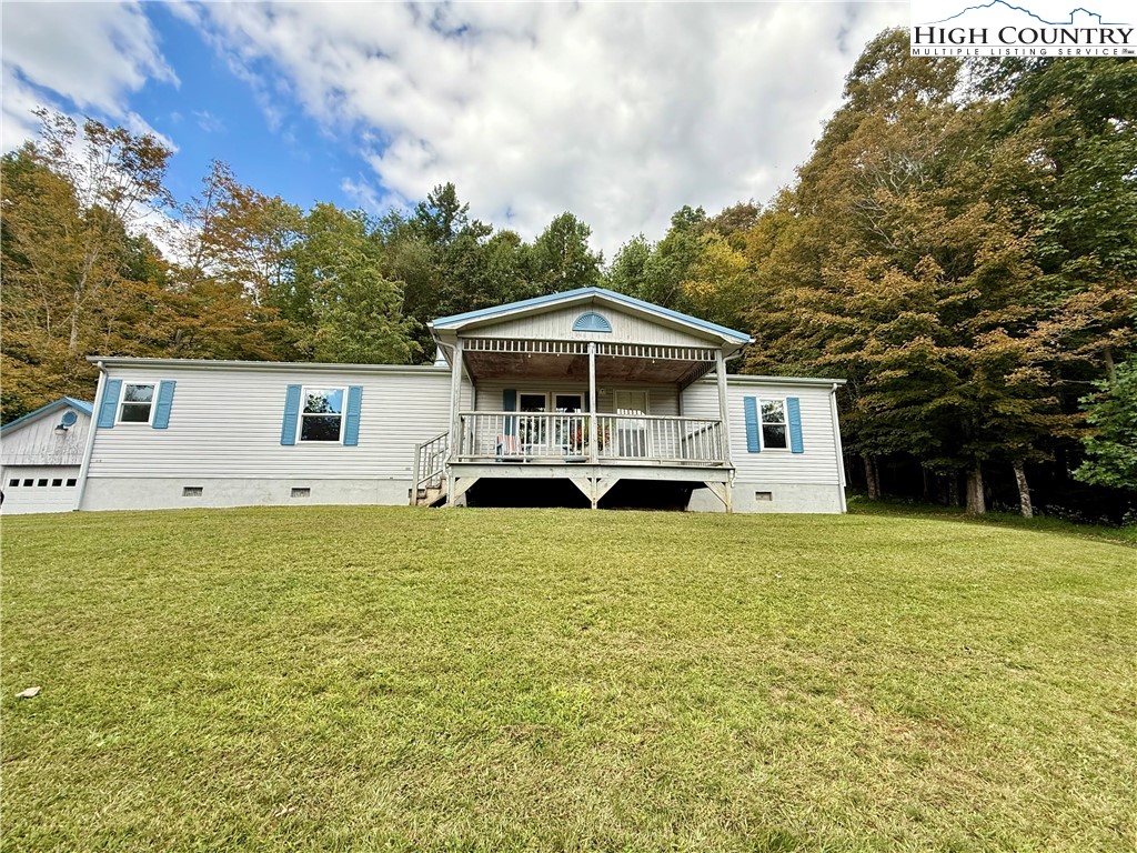 304 The Mulberry Cove Road Boone, NC 28607 - Photo 41 of 45 a front view of a house with a yard