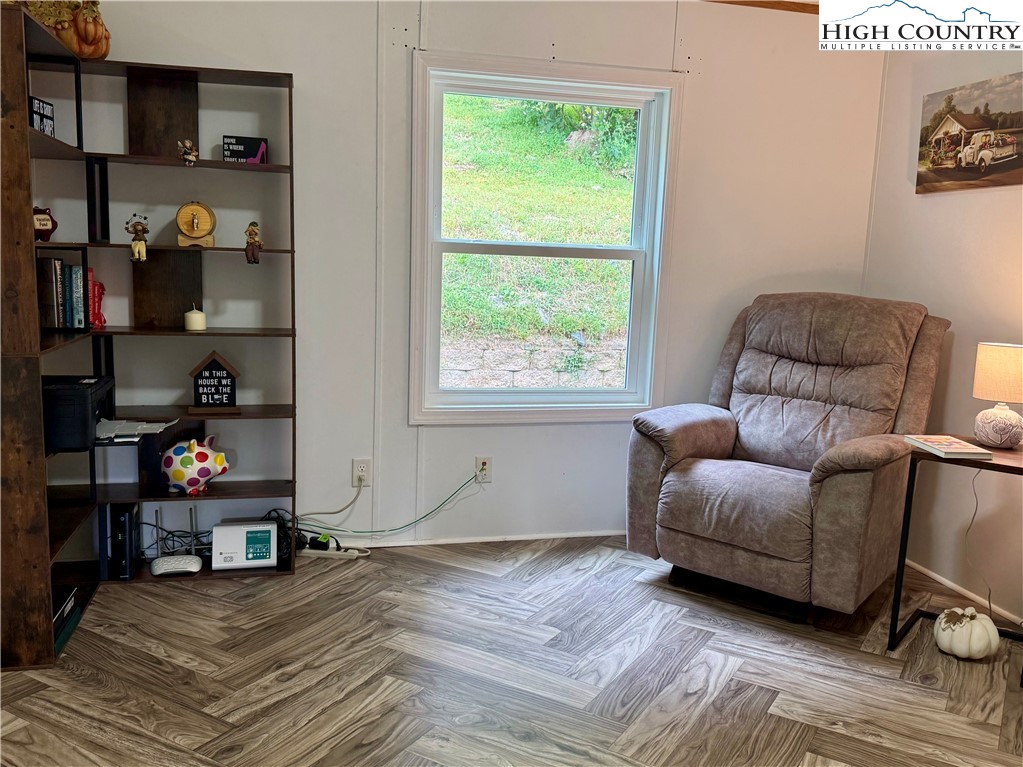 304 The Mulberry Cove Road Boone, NC 28607 - Photo 9 of 45 a living room with furniture and a window