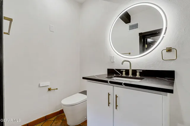 view of a with a wall and potted plants