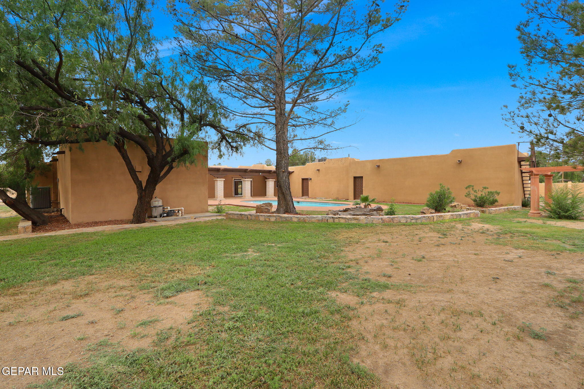 1067 Gardner Road El Paso, TX 79932 - Photo 39 of 59 a view of backyard with green space