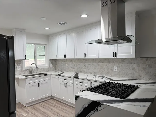 $840,000 | 11224 Studebaker Road, Norwalk, CA 90650