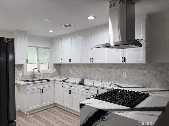 $840,000 | 11224 Studebaker Road, Norwalk, CA 90650