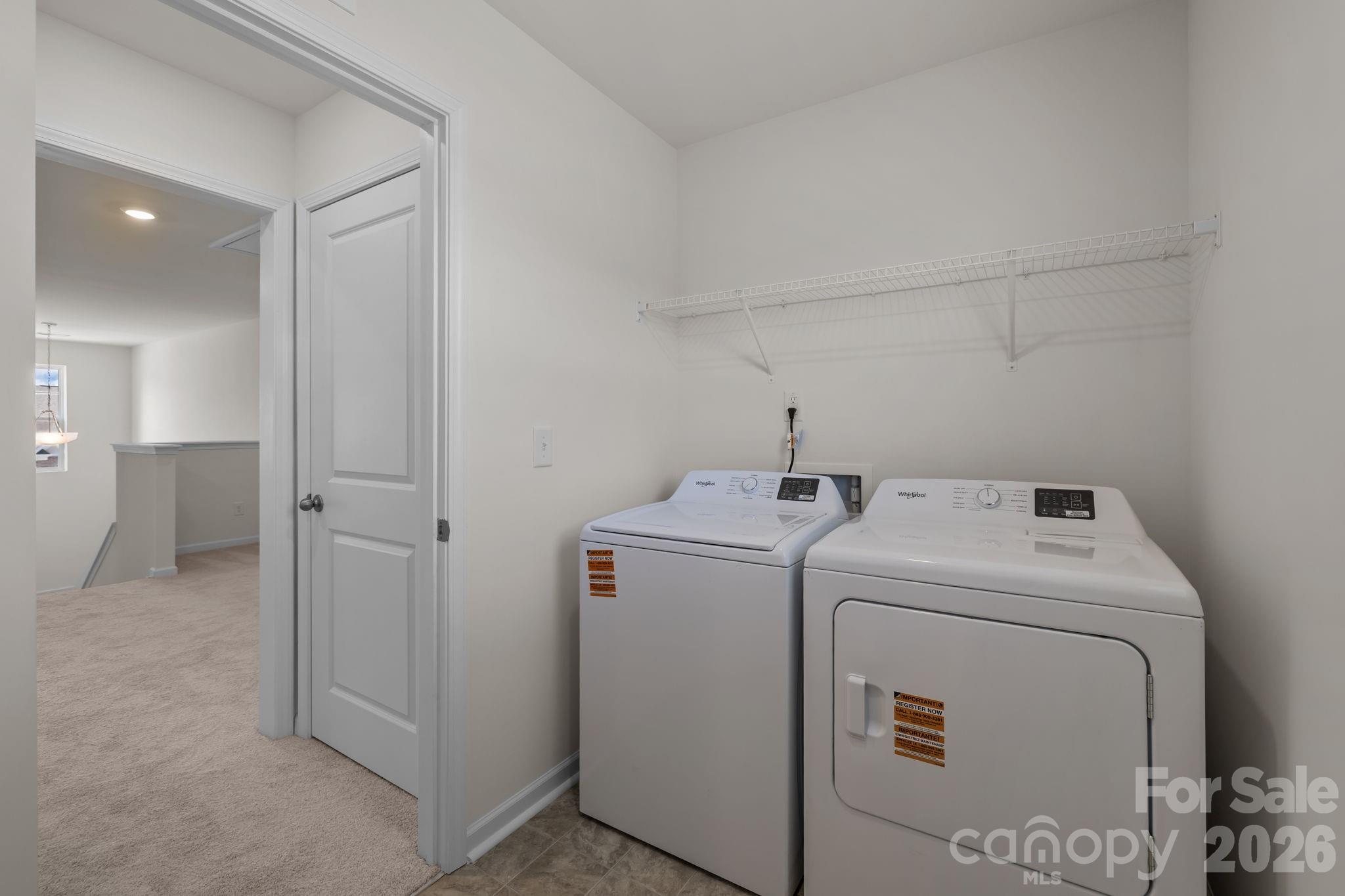 463 Brick House Road York, SC 29745 - Photo 27 of 35 a view of storage and utility room with washer and dryer