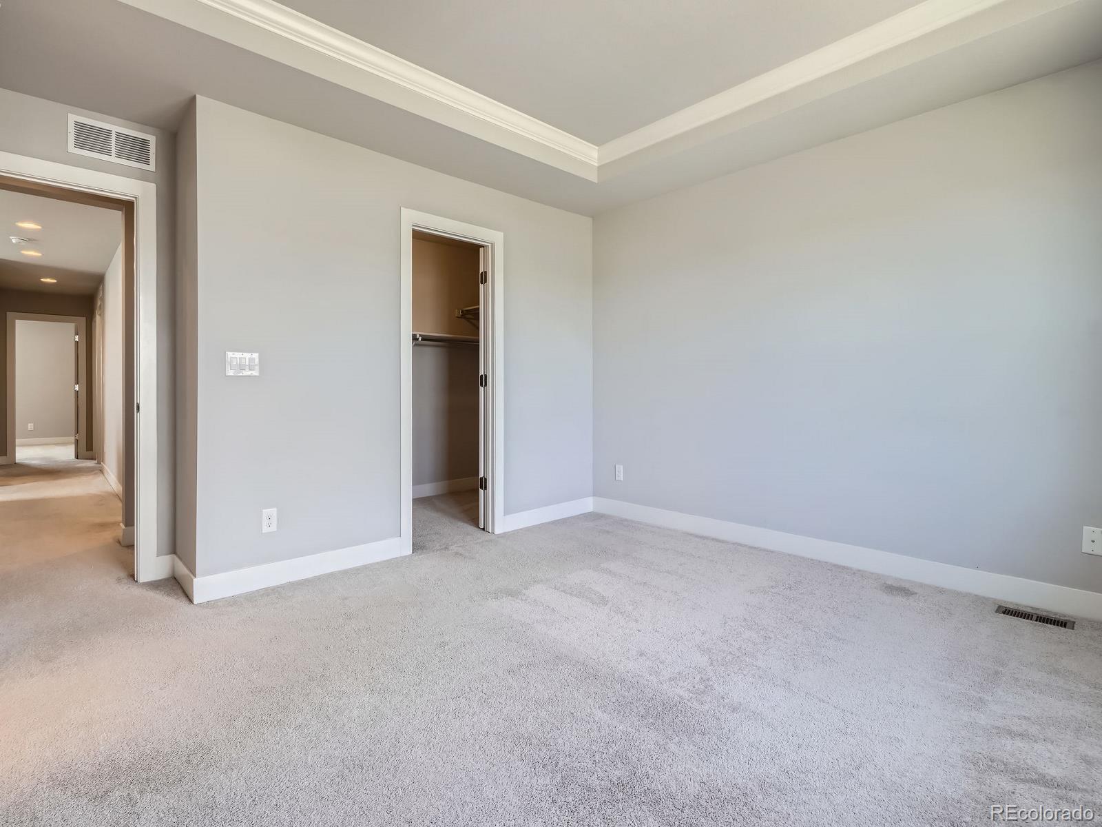 4773 Kittredge Street Denver, CO 80239 - Photo 14 of 32 an empty room with closet area