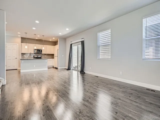 a view of a kitchen and window