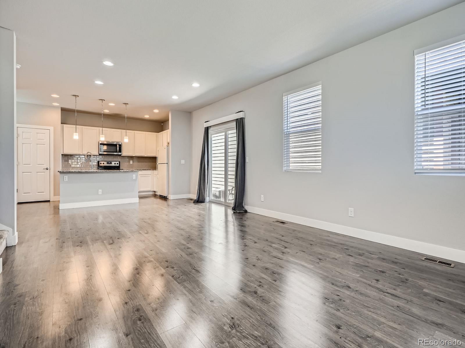 4773 Kittredge Street Denver, CO 80239 - Photo 5 of 32 a view of a kitchen and window