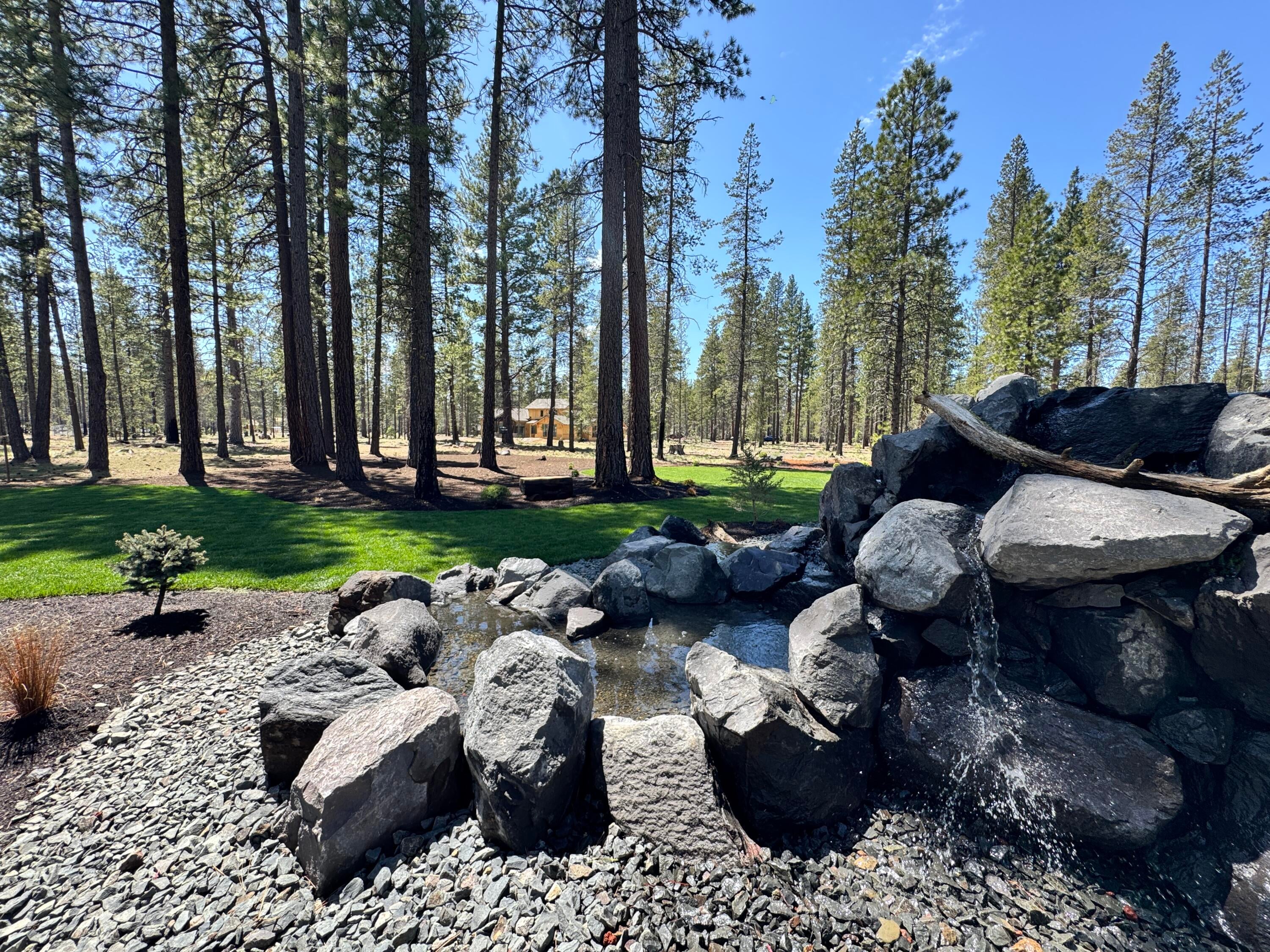 17800 Preservation Loop, Unit 489 Bend, OR 97707 - Photo 6 of 27 Step out your back door and enjoy one of the many parks within the Caldera Springs community. Set off on a scenic trail winding through towering ponderosa pines, tranquil lakes, and gentle streams, fully immersing yourself in the wonders of nature. Along the way, take in stunning vistas, encounter local wildlife, and forge a deeper connection with the outdoors as you explore the natural beauty that surrounds you.