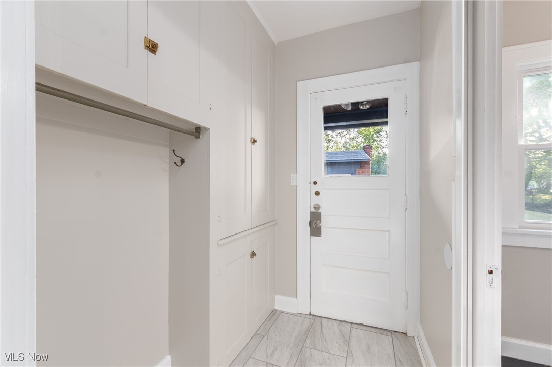 3459 Helen Road Shaker Heights, OH 44122 - Photo 13 of 29 Doorway to outside featuring plenty of natural light and baseboards