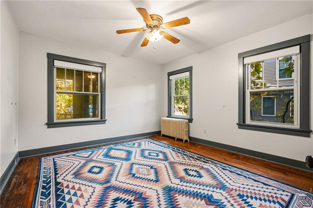 218 Elmore Road Pittsburgh, PA 15221 - Photo 11 of 34 Large windows bring natural light into the space.
