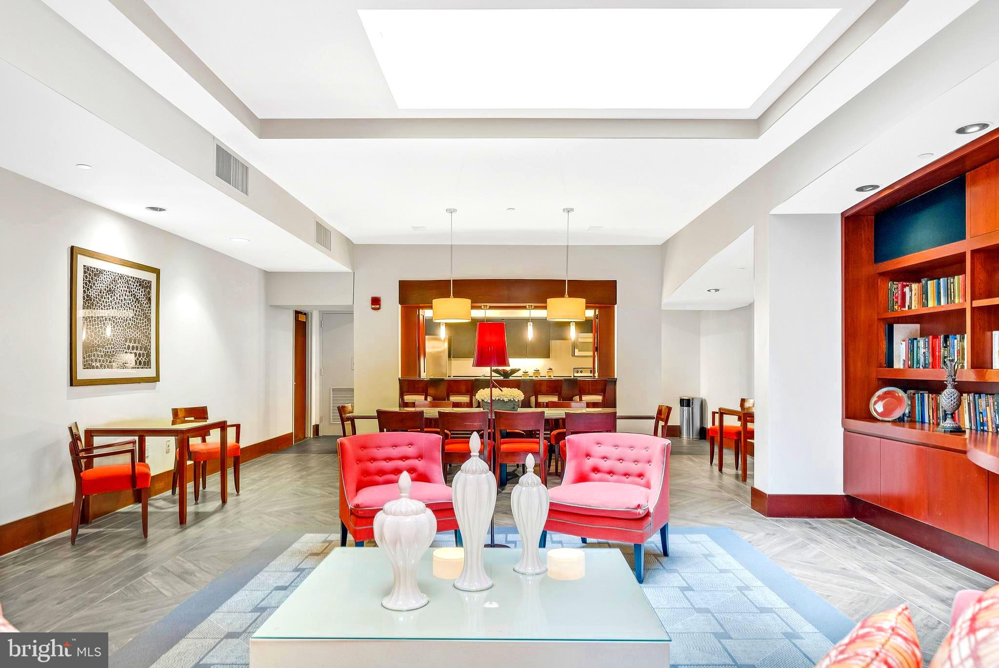 1600-18 Arch Street, Unit 706 Philadelphia, PA 19103 - Photo 17 of 19 a living room with furniture and a flat screen tv