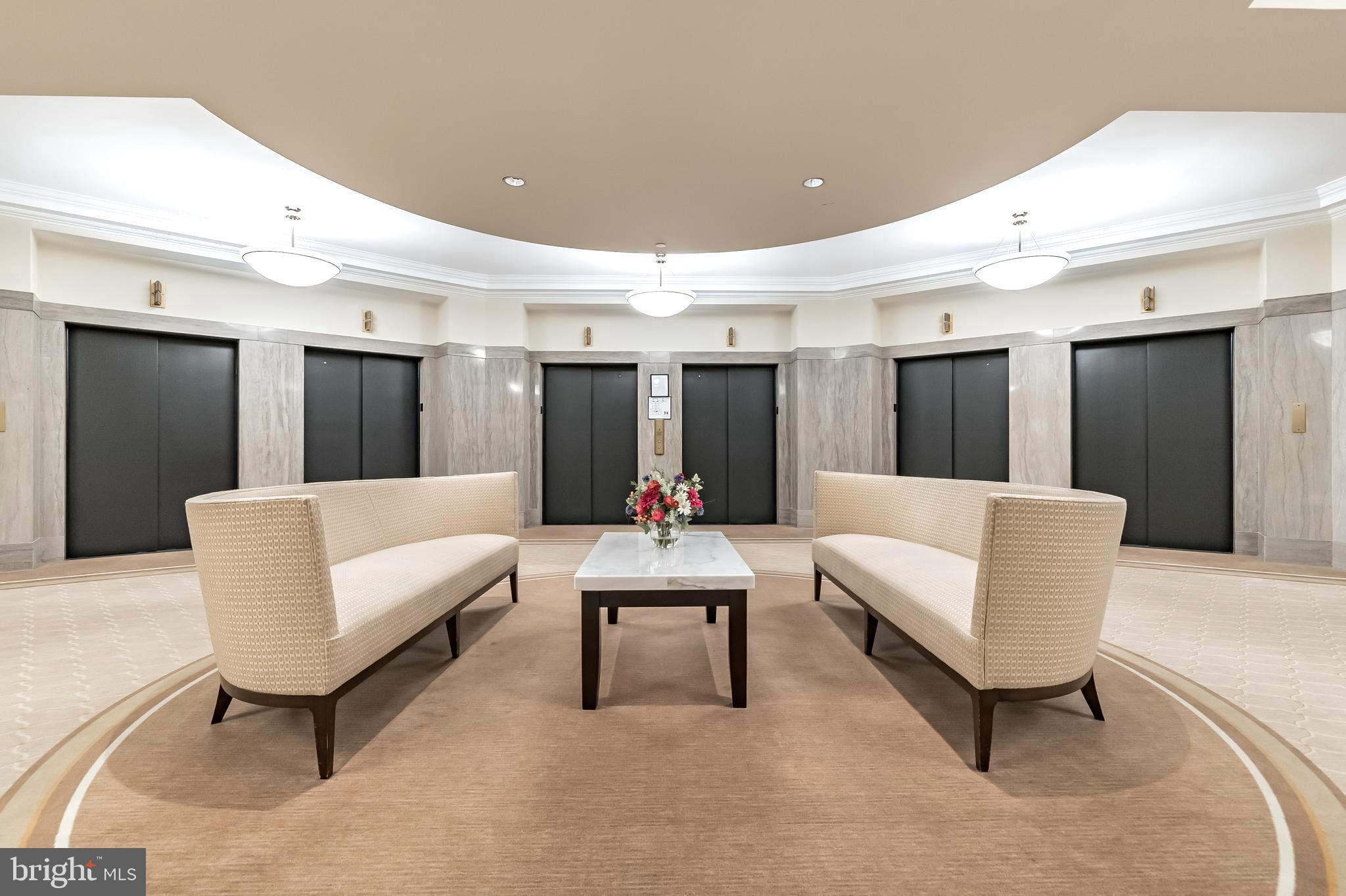 1600-18 Arch Street, Unit 706 Philadelphia, PA 19103 - Photo 18 of 19 a living room with furniture and white walls