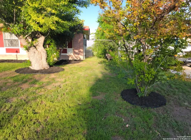 a view of outdoor space and yard