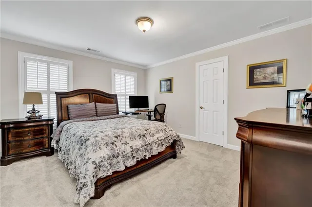 a view of a hallway with a room