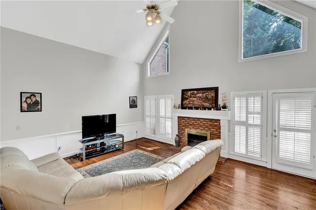 a view of a dining room with furniture and window