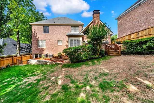 a terrace with outdoor seating and wooden floor