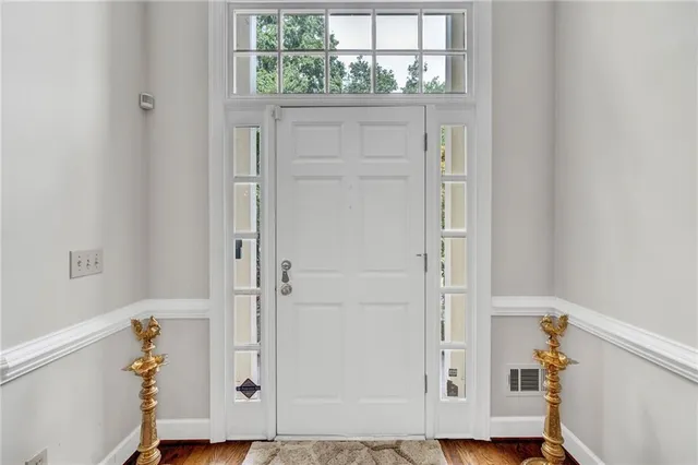 a bathroom with a tub and shower