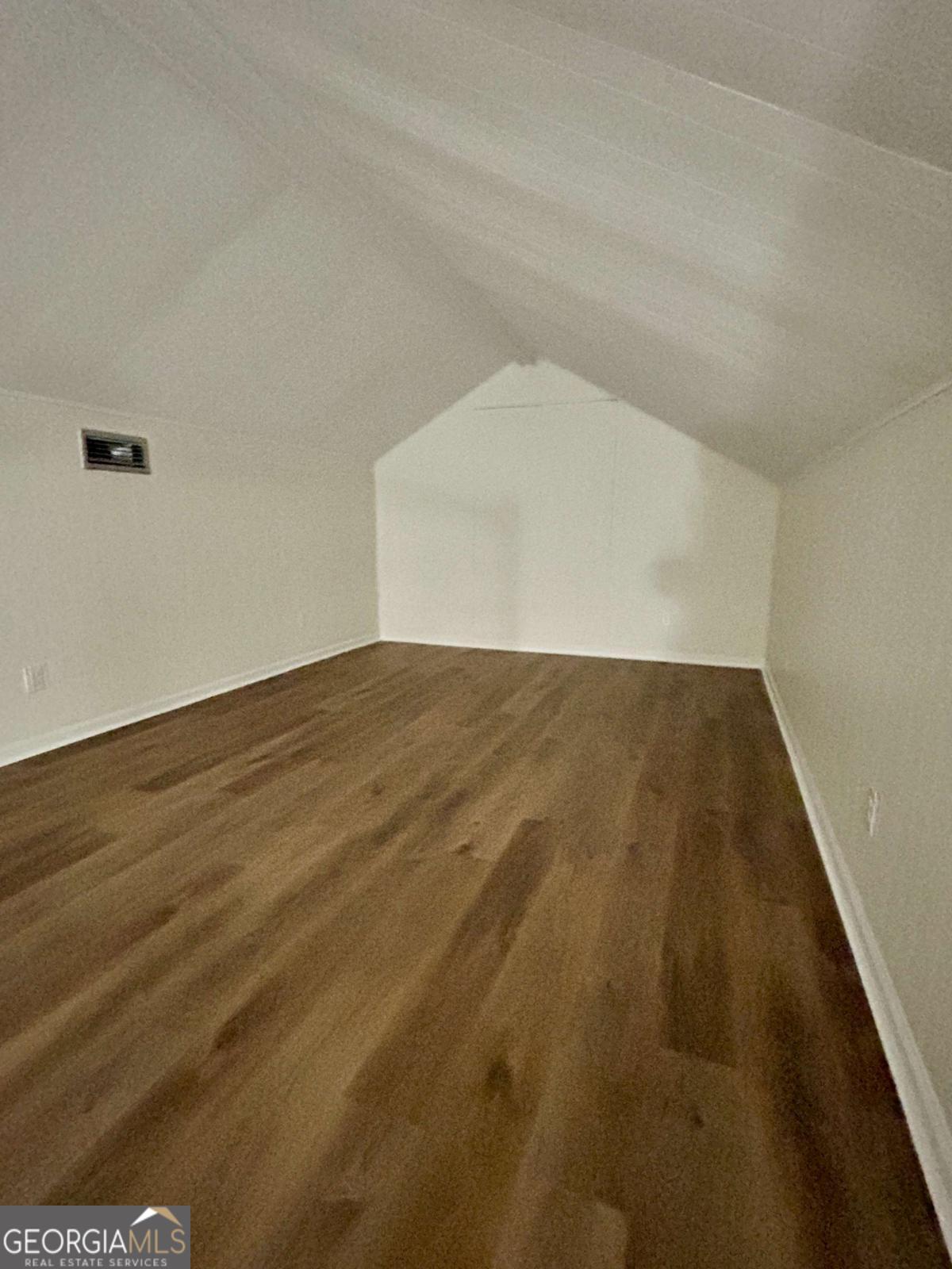 1430 Madison Avenue Tifton, GA 31794 - Photo 17 of 27 a view of empty room with wooden floor