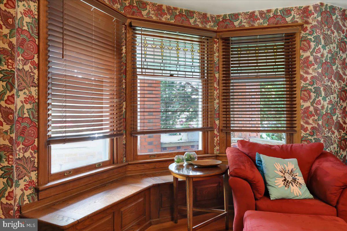 207 State Street Reading, PA 19607 - Photo 12 of 55 a outdoor living space with furniture and a window