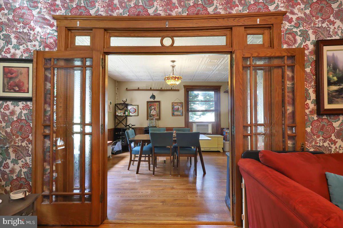 207 State Street Reading, PA 19607 - Photo 14 of 55 a view of a dining room with furniture window and wooden floor
