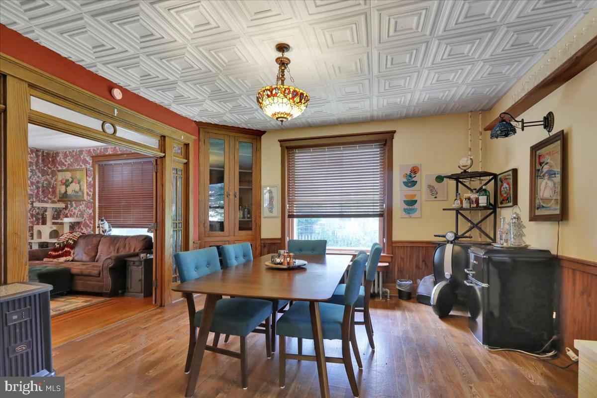 207 State Street Reading, PA 19607 - Photo 15 of 55 a view of a dining room with furniture and wooden floor