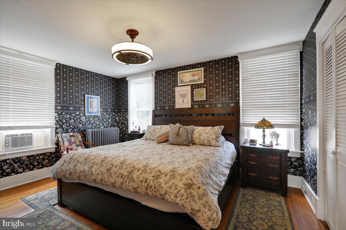 207 State Street Reading, PA 19607 - Photo 22 of 55 a bedroom with a bed and a large window