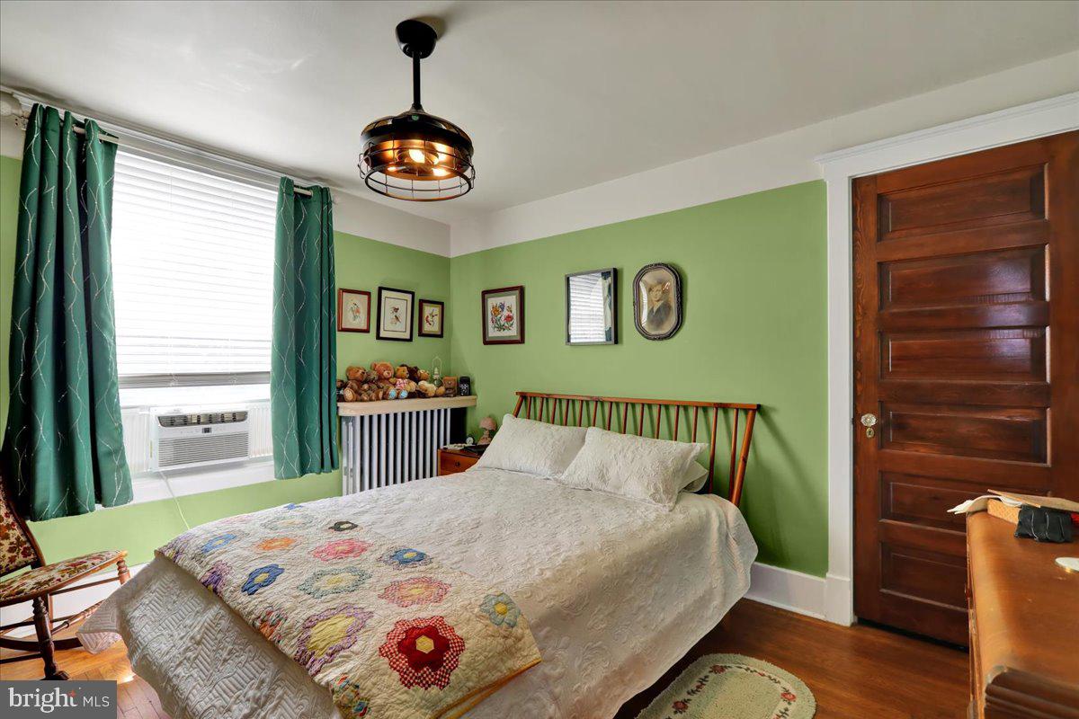 207 State Street Reading, PA 19607 - Photo 24 of 55 a bedroom with a bed and a window