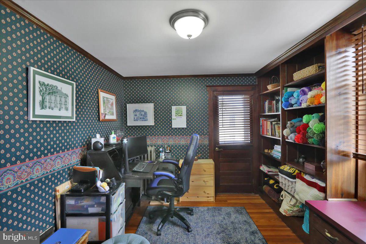 207 State Street Reading, PA 19607 - Photo 29 of 55 a living room with furniture and a flat screen tv