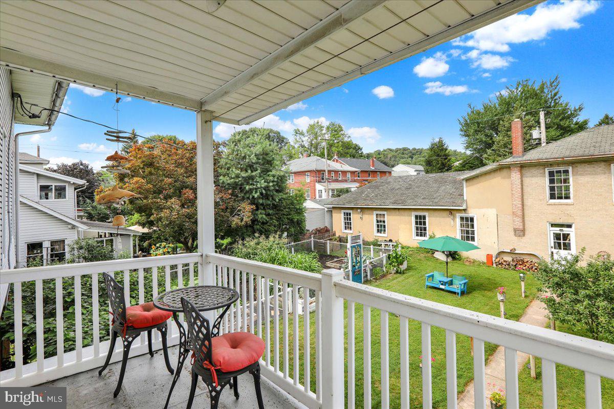 207 State Street Reading, PA 19607 - Photo 30 of 55 a view of a chair and tables in the balcony