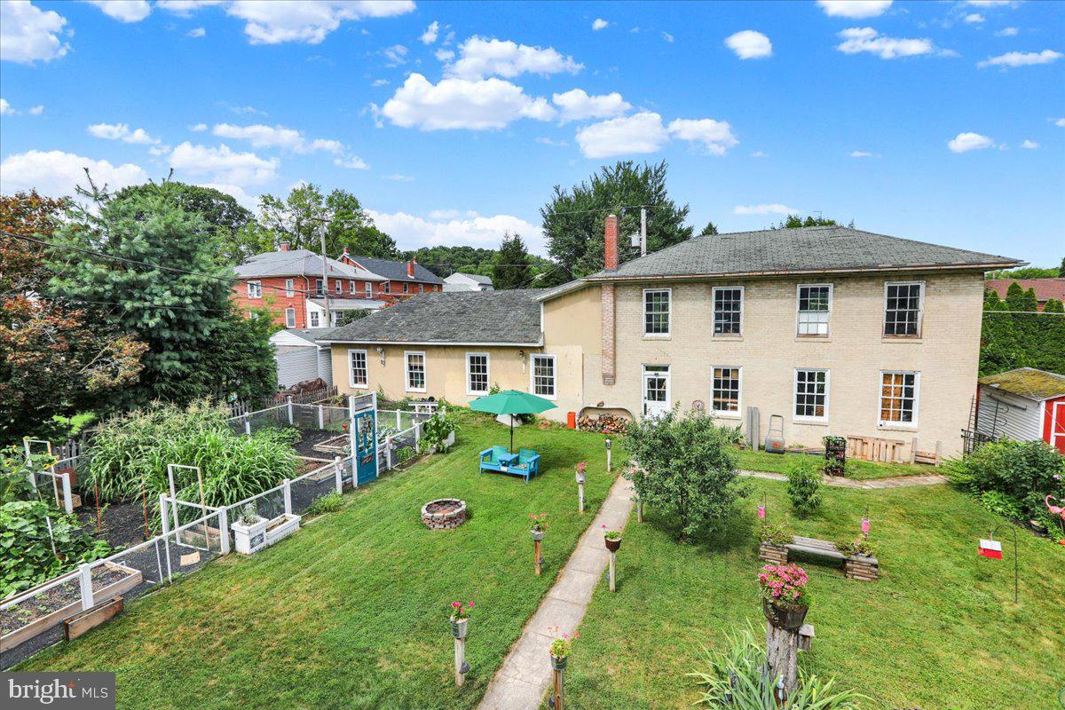 207 State Street Reading, PA 19607 - Photo 36 of 55 a front view of a house with garden