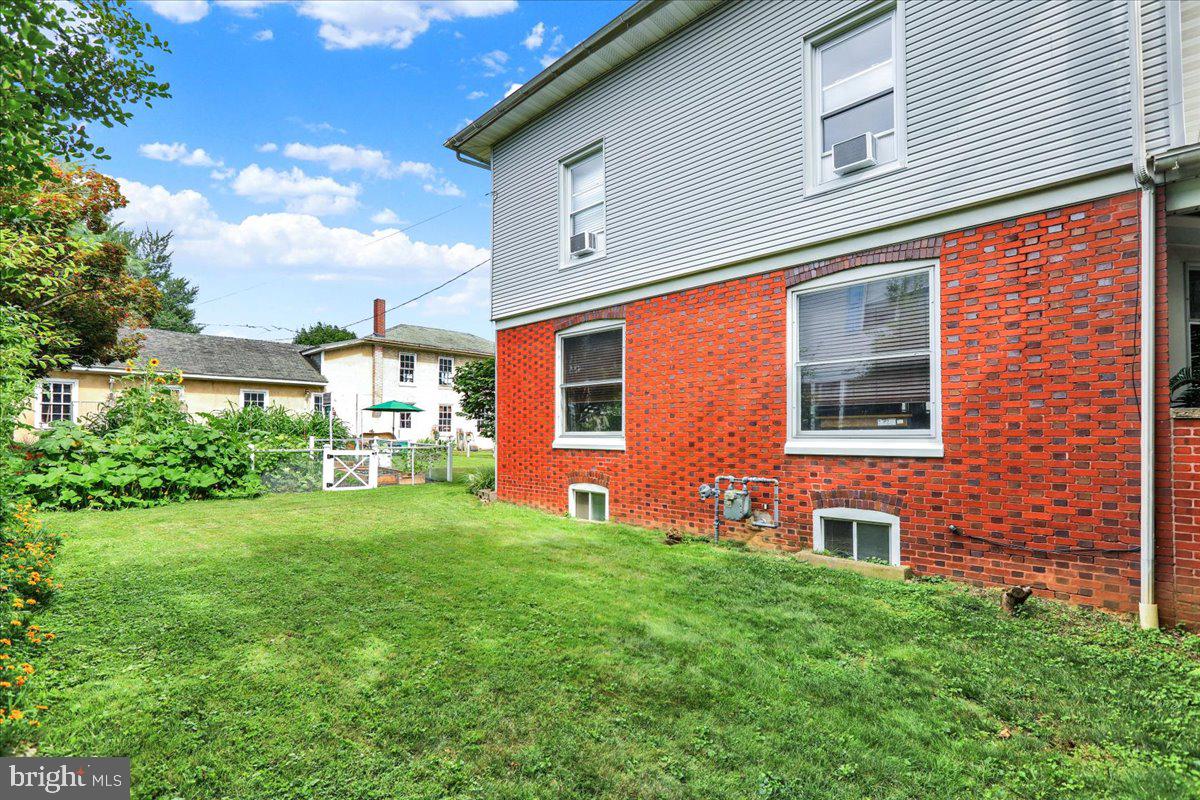 207 State Street Reading, PA 19607 - Photo 38 of 55 a front view of a house with a yard