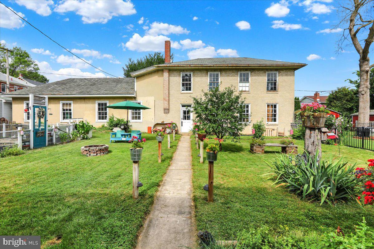 207 State Street Reading, PA 19607 - Photo 42 of 55 a view of a house with a backyard and a patio