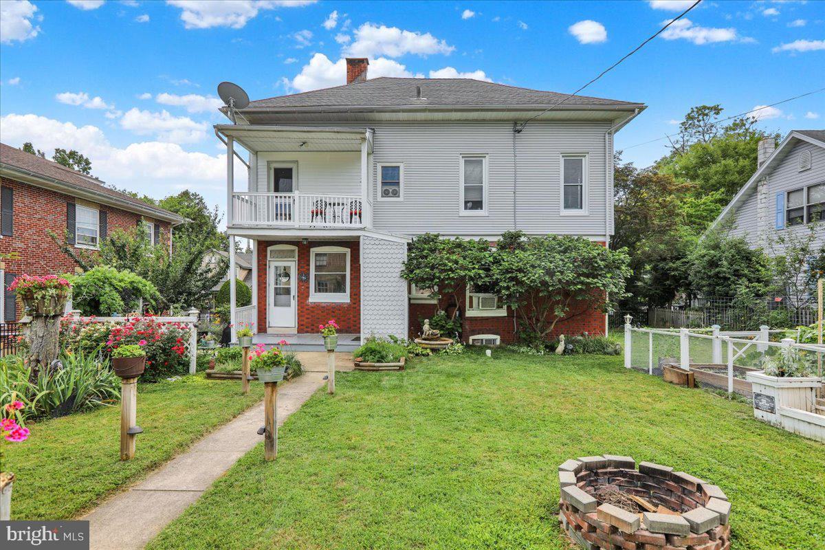 207 State Street Reading, PA 19607 - Photo 48 of 55 a front view of a house with a yard