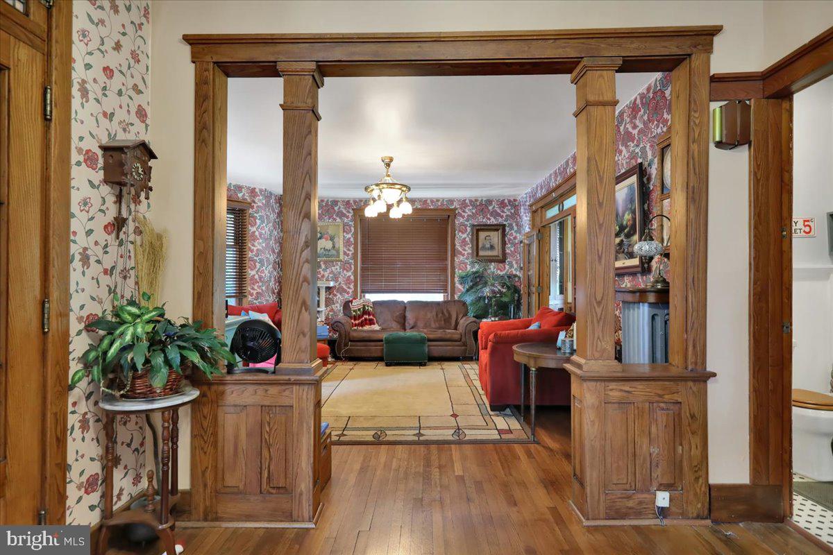 207 State Street Reading, PA 19607 - Photo 8 of 55 a living room with furniture and a potted plant