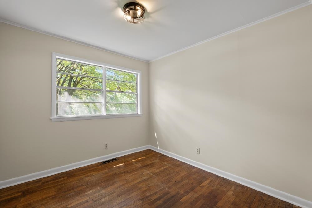 211 Drake Avenue Ripley, TN 38063 - Photo 18 of 25 an empty room with a window