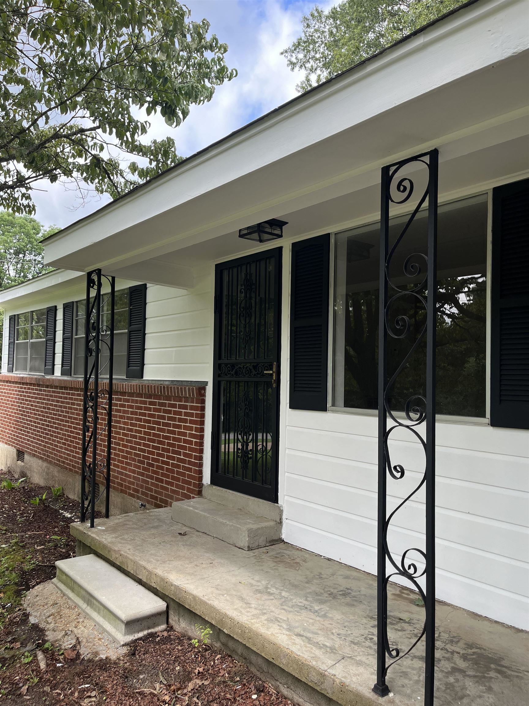 211 Drake Avenue Ripley, TN 38063 - Photo 4 of 25 a view of a entryway door front of house
