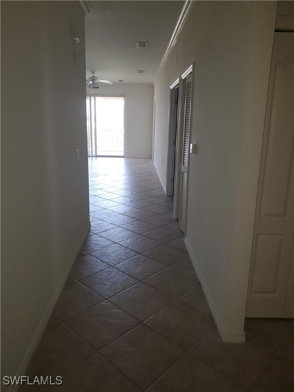 8490 Kingbird Loop, Unit 942 Estero, FL 33967 - Photo 5 of 11 a view of hallway with an empty space