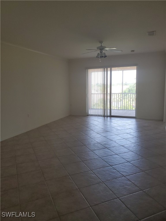 8490 Kingbird Loop, Unit 942 Estero, FL 33967 - Photo 9 of 11 a view of an empty room and window