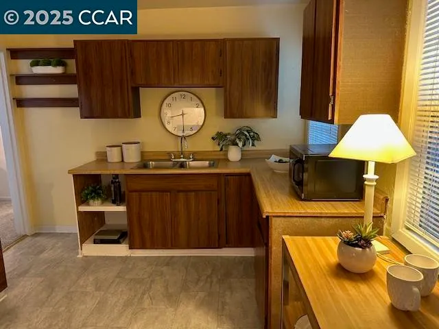 a living room with a table and chairs