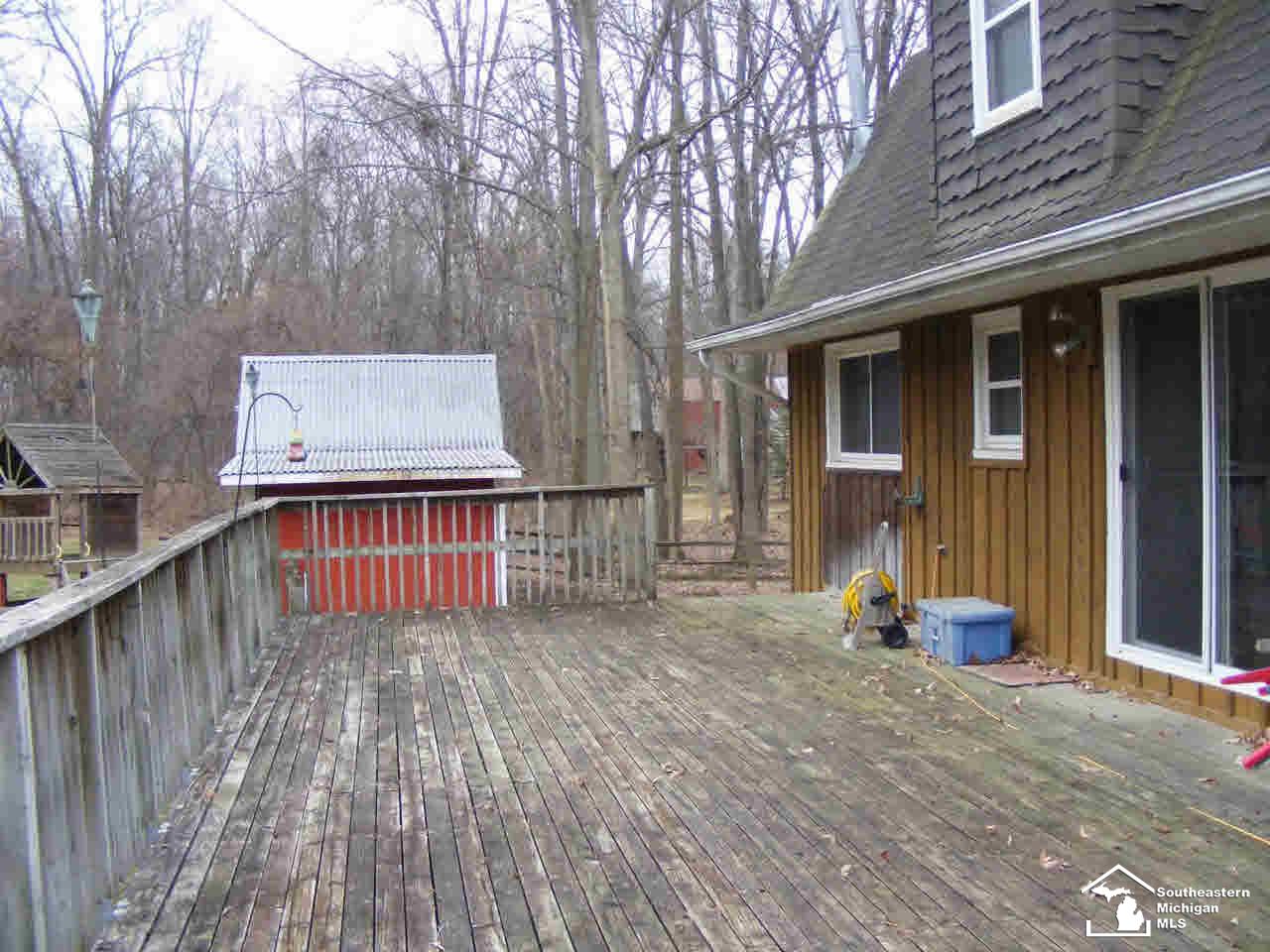 Fenced dog area off deck