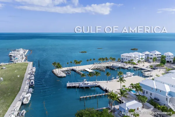 a view of a chairs and table on the wooden floor
