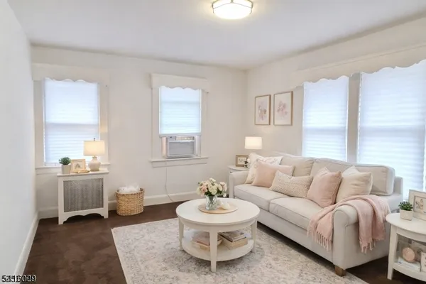 a living room with furniture and a couch