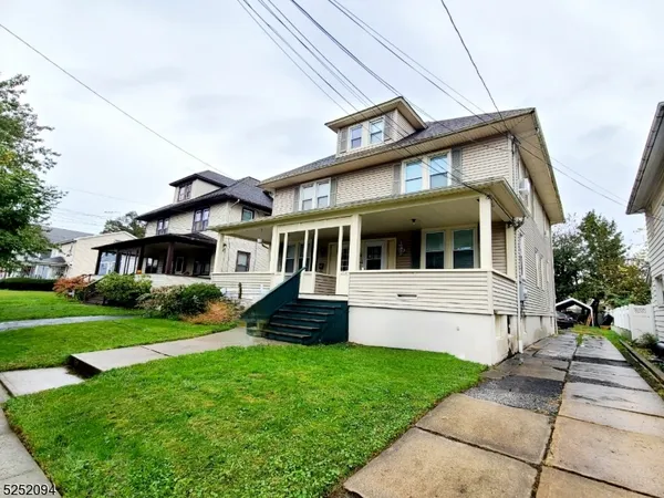 a front view of house with yard