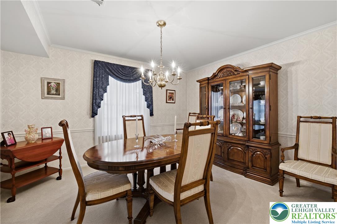 1700 Brandywine Road Allentown, PA 18104 - Photo 11 of 48 a view of a dining room with furniture and chandelier