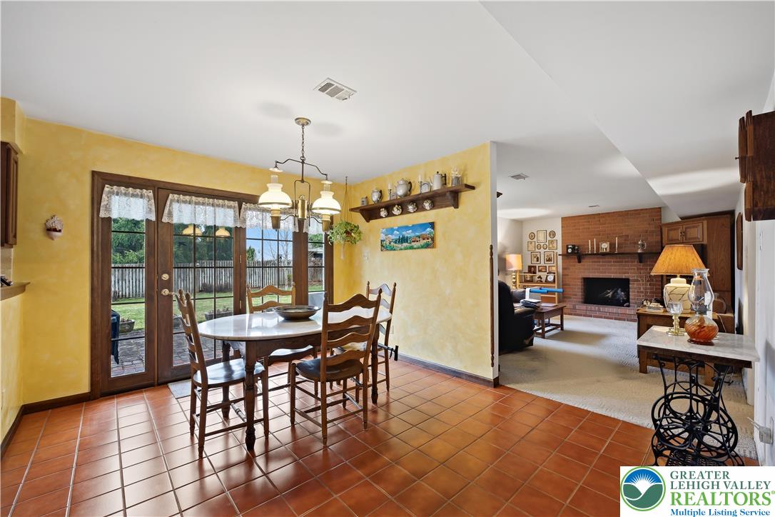 1700 Brandywine Road Allentown, PA 18104 - Photo 13 of 48 a view of a dining room with furniture chandelier and a rug