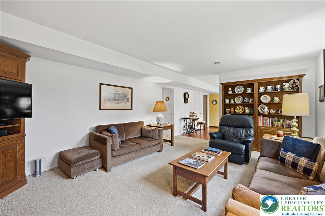 1700 Brandywine Road Allentown, PA 18104 - Photo 19 of 48 a living room with furniture and a flat screen tv