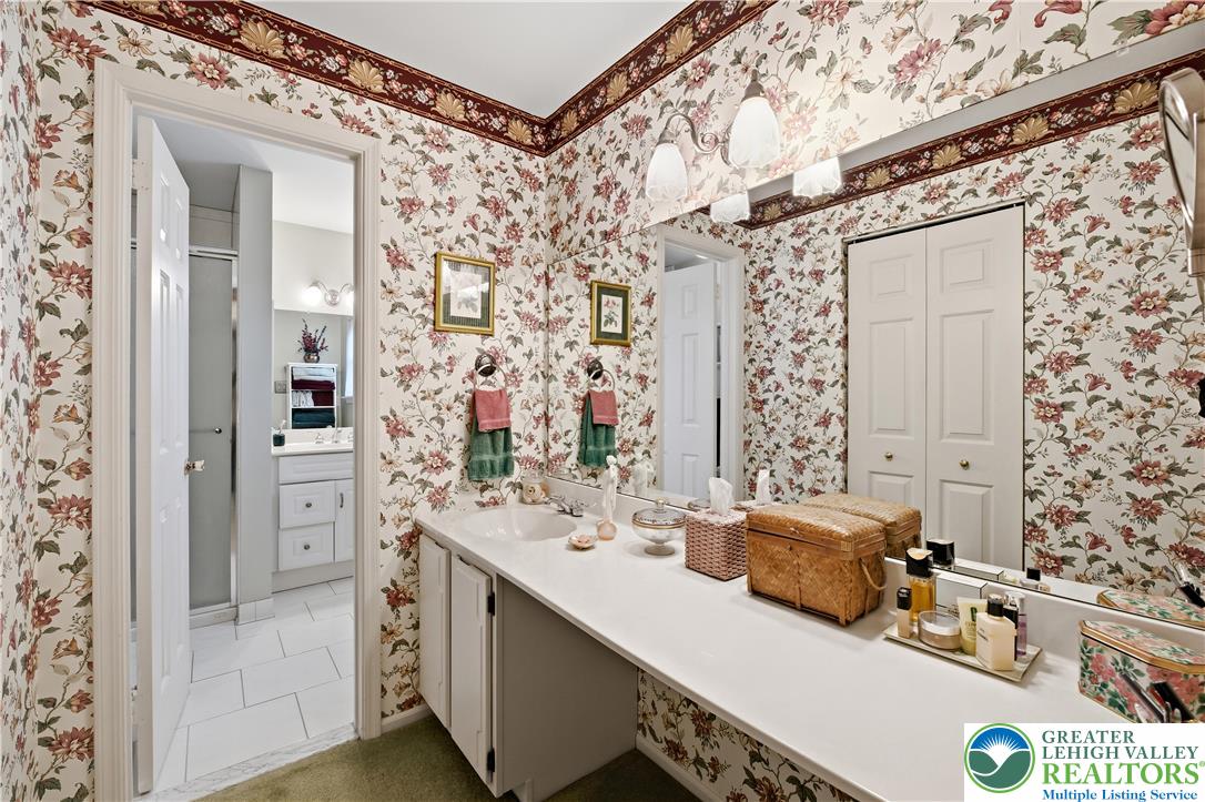 1700 Brandywine Road Allentown, PA 18104 - Photo 29 of 48 a bathroom with a double vanity sink mirror and shower