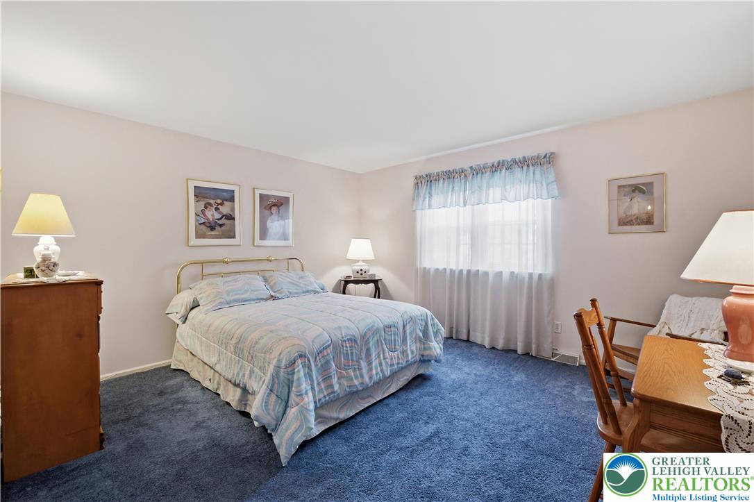 1700 Brandywine Road Allentown, PA 18104 - Photo 34 of 48 a bedroom with a bed chair and a window