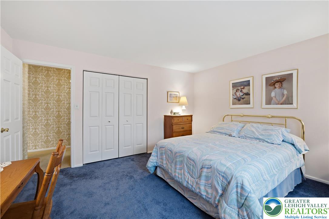 1700 Brandywine Road Allentown, PA 18104 - Photo 35 of 48 a spacious bedroom with a bed and a cabinets